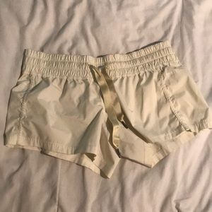 Pale yellow lulu lemon shorts